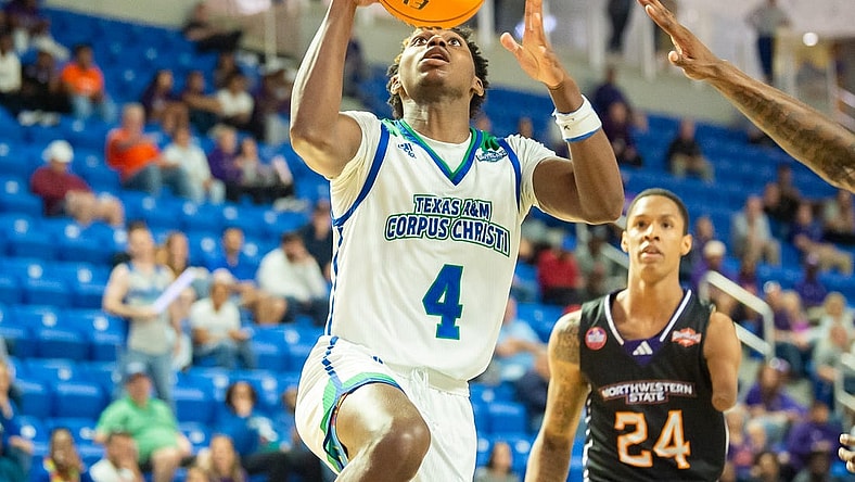 Mar 8, 2023; Lake Charles, LA, USA; Texas A&M-Corpus Christi Islanders guard Jalen Jackson (4) drives to the basket against the Northwestern State Demons during the Southland Basketball Championships at the Legacy Center. Mandatory Credit: Scott Clause-USA TODAY Sports