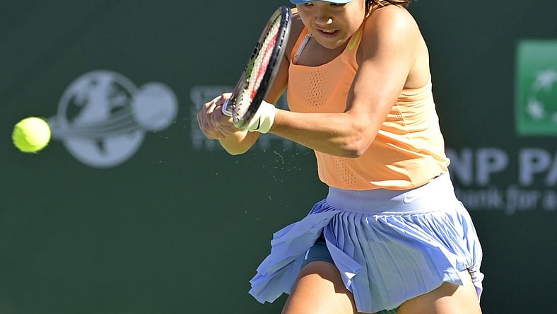 Mar 9, 2023; Indian Wells, CA, USA;  Emma Raducanu (GBR) hits a shot in her first round match against Danka Kovinic (not pictured) on day 4 of the BNP Paribas Open at the Indian Wells Tennis Garden. Mandatory Credit: Jayne Kamin-Oncea-USA TODAY Sports