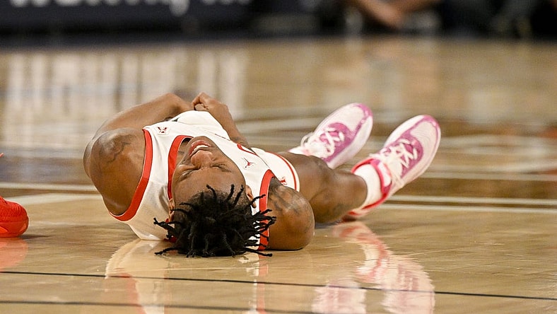 Mar 11, 2023; Fort Worth, TX, USA; Houston Cougars guard Marcus Sasser (0) is injured during the first half against the Cincinnati Bearcats at Dickies Arena. Mandatory Credit: Jerome Miron-USA TODAY Sports