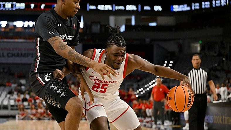 Mar 11, 2023; Fort Worth, TX, USA; Cincinnati Bearcats guard Landers Nolley II (2) battles for the ball with Houston Cougars forward Jarace Walker (25) during the first half at Dickies Arena. Mandatory Credit: Jerome Miron-USA TODAY Sports