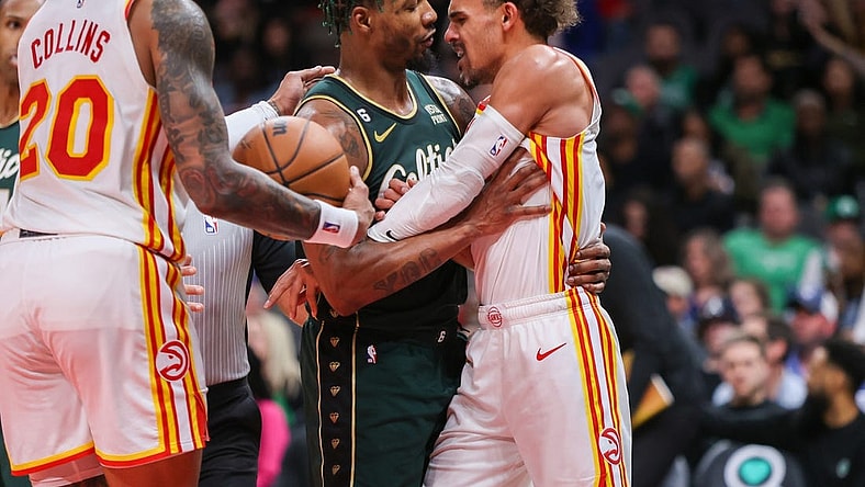 Mar 11, 2023; Atlanta, Georgia, USA; Boston Celtics guard Marcus Smart (36) gets in the face of Atlanta Hawks guard Trae Young (11) in the second half at State Farm Arena. Mandatory Credit: Brett Davis-USA TODAY Sports