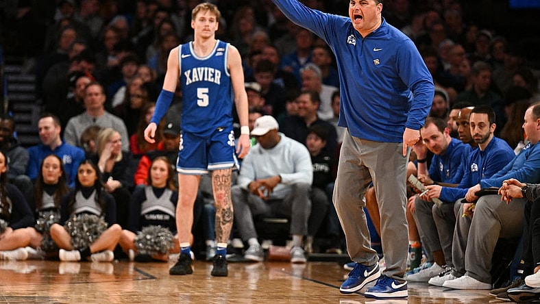 Mar 11, 2023; New York, NY, USA; Xavier Musketeers head coach Sean Miller yells instructions to players while Xavier Musketeers guard Adam Kunkel (5) looks on during the second half at Madison Square Garden. Mandatory Credit: Mark Smith-USA TODAY Sports