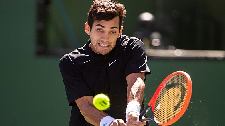 Cristian Garin of Chile hits to Casper Ruud of Norway during their round three match at the BNP Paribas Open at the Indian Wells Tennis Garden in Indian Wells, Calif., Sunday, March 12, 2023.