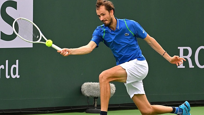 Mar 14, 2023; Indian Wells, CA, USA; Daniil Medvedev (RUS) hits a shot as he defeated Alexander Zverev (GER) in the fourth round of the BNP Paribas Open at the Indian Wells Tennis Garden. Mandatory Credit: Jayne Kamin-Oncea-USA TODAY Sports