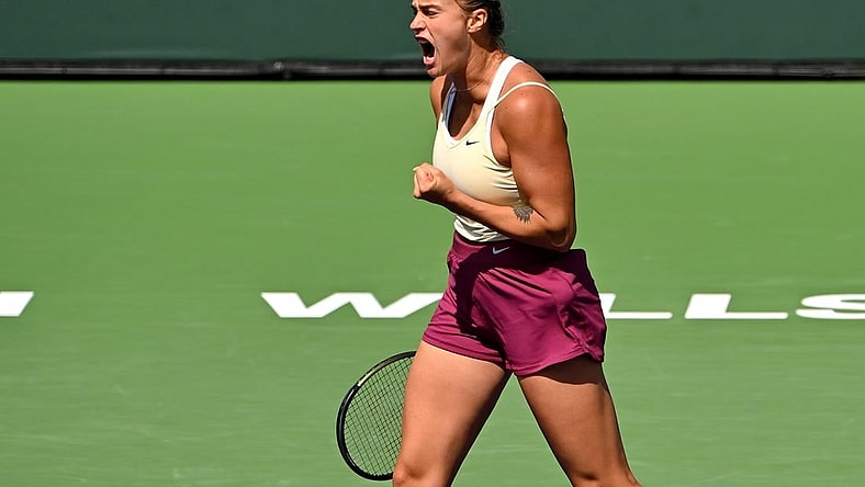 Mar 15, 2023; Indian Wells, CA, USA;  Aryna Sabalenka celebrates after winning a point as she defeats Coco Gauff (USA) in the quarterfinals of the BNP Paribas Open at the Indian Wells Tennis Garden. Mandatory Credit: Jayne Kamin-Oncea-USA TODAY Sports