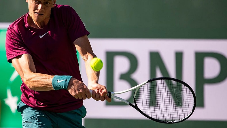 Jannik Sinner of Italy hits to Taylor Fritz of the United States during their quarterfinal match at the BNP Paribas Open at the Indian Wells Tennis Garden in Indian Wells, Calif., Thursday, March 16, 2023.