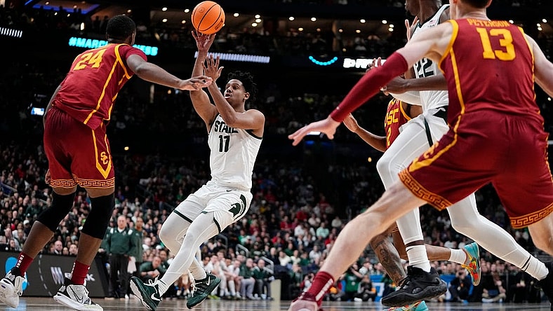 Mar 17, 2023; Columbus, Ohio, USA;  Michigan State Spartans guard A.J. Hoggard (11) lobs a pass over USC Trojans forward Joshua Morgan (24) during the first round of the NCAA men   s basketball tournament at Nationwide Arena. Mandatory Credit: Adam Cairns-The Columbus Dispatch

Basketball Ncaa Men S Basketball Tournament