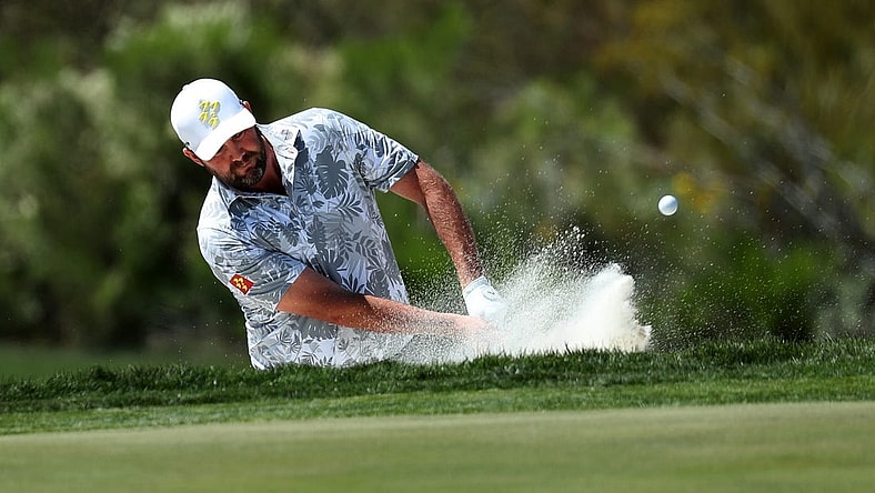 Mar 18, 2023; Tucson, Arizona, USA; Marc Leishman hits from the bunker of 9th hole during the second round of the LIV Golf event at The Gallery Golf Club. Mandatory Credit: Zachary BonDurant-USA TODAY Sports
