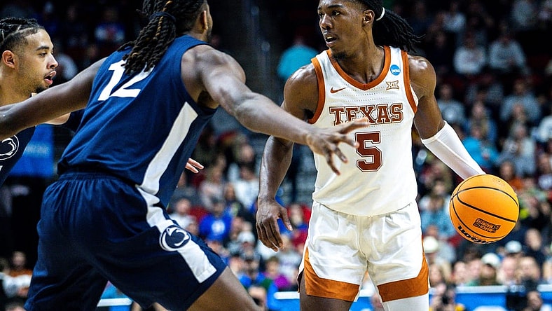 Texas guard Marcus Carr looks to drive to the basket against Penn State guard Evan Mahaffey during an NCAA men  s basketball tournament second round basketball game on Saturday, March 18, 2023, at Wells Fargo Arena, in Des Moines, Iowa.