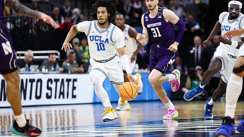 Mar 18, 2023; Sacramento, CA, USA; UCLA Bruins guard Tyger Campbell (10) dribbles down the court during the first half against the Northwestern Wildcats at Golden 1 Center. Mandatory Credit: Kelley L Cox-USA TODAY Sports
