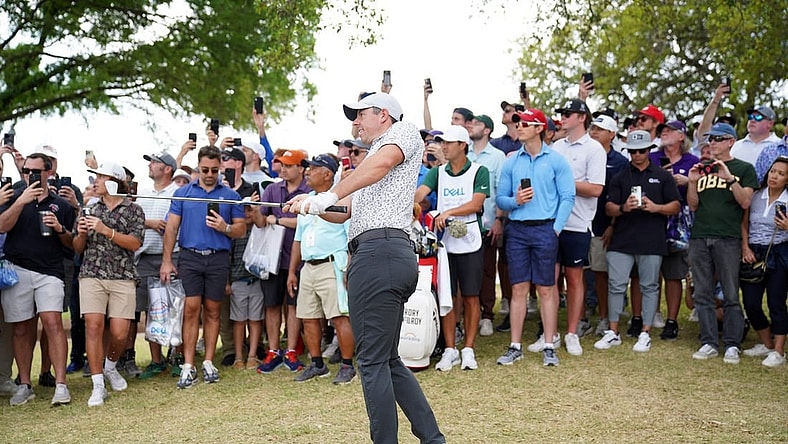 Mar 23, 2023; Austin, Texas, USA; Rory McIlroy chips from outside the ropes during the second round of the World Golf Championships-Dell Technologies Match Play golf tournament. Mandatory Credit: Dustin Safranek-USA TODAY Sports