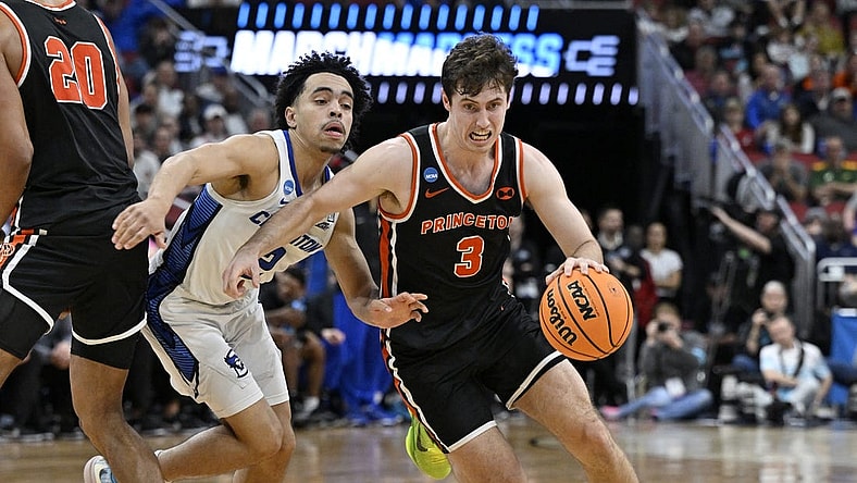Mar 24, 2023; Louisville, KY, USA; Princeton Tigers guard Ryan Langborg (3) dribbles against Creighton Bluejays guard Ryan Nembhard (2) during the second half of the NCAA tournament round of sixteen at KFC YUM! Center. Mandatory Credit: Jamie Rhodes-USA TODAY Sports