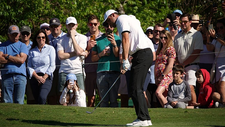 Mar 25, 2023; Austin, Texas, USA; Scotty Scheffler chips from the fairway at the sixteenth hole in a match against Jason Day during the fourth round of the World Golf Championships-Dell Technologies Match Play golf tournament. Mandatory Credit: Dustin Safranek-USA TODAY Sports