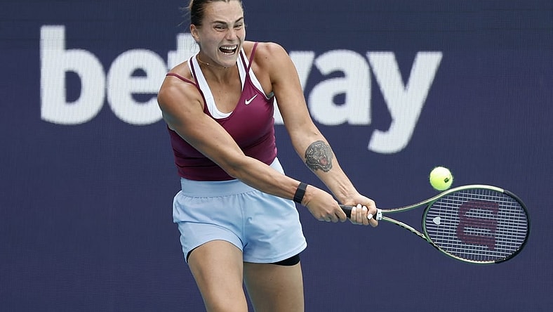 Mar 29, 2023; Miami, Florida, US; Aryna Sabalenka hits a backhand against Sorana Cirstea (ROU) (not pictured) in a women's singles quarterfinal on day ten of the Miami Open at Hard Rock Stadium. Mandatory Credit: Geoff Burke-USA TODAY Sports