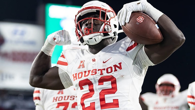 Nov 6, 2021; Tampa, Florida, USA; Houston Cougars running back Alton McCaskill (22) reacts after scoring a touchdown during the second half against the South Florida Bulls at Raymond James Stadium. Mandatory Credit: Matt Pendleton-USA TODAY Sports