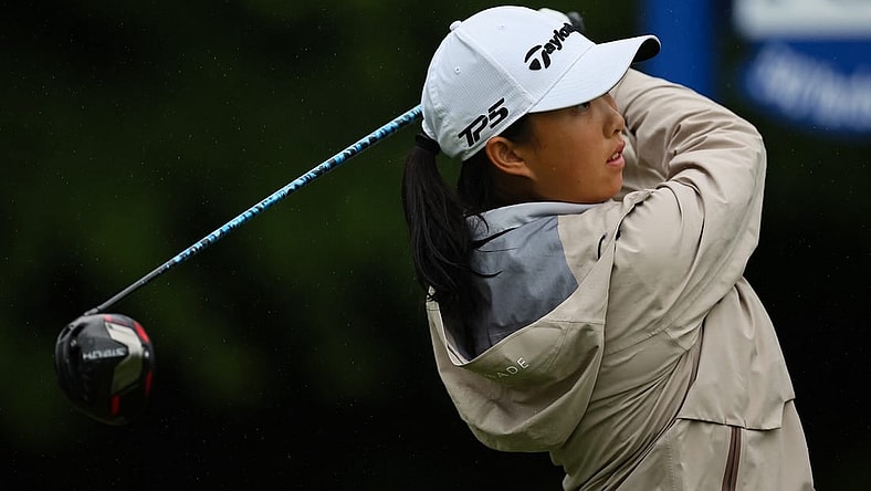 Jun 23, 2022; Bethesda, Maryland, USA; Ruoning Yin plays her shot from the 11th tee during the first round of the KPMG Women's PGA Championship golf tournament at Congressional Country Club. Mandatory Credit: Scott Taetsch-USA TODAY Sports