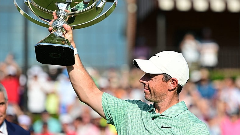 Aug 28, 2022; Atlanta, Georgia, USA; Rory McIlroy holds up the FedEx Cup trophy after winning the TOUR Championship golf tournament. Mandatory Credit: Adam Hagy-USA TODAY Sports