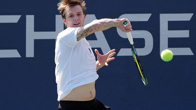 Aug 31, 2022; Flushing, NY, USA;  Alexander Bublik of Kazakhstan hits a shot against Pablo Carreno Busta of Spain on day three of the 2022 U.S. Open tennis tournament at USTA Billie Jean King Tennis Center. Mandatory Credit: Jerry Lai-USA TODAY Sports