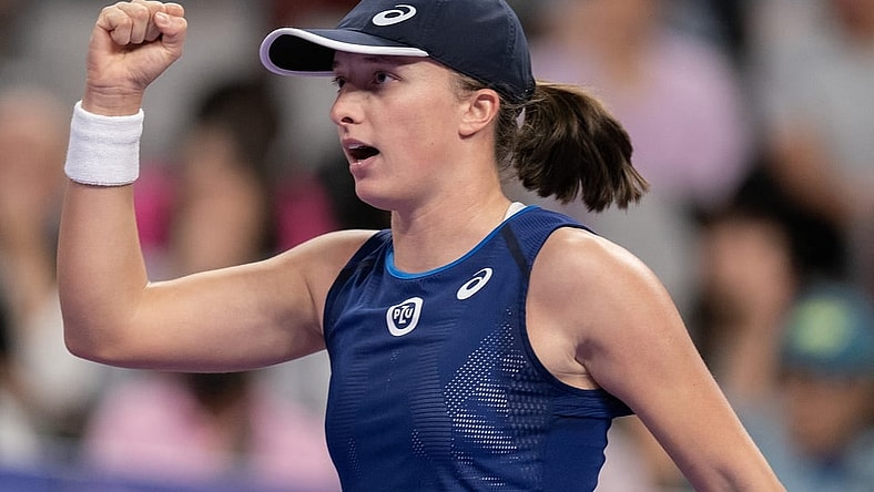 Nov 6, 2022; Forth Worth, TX, USA; Iga Swiatek (POL) reacts to a point during her semi final match against Aryna Sabalenka on day seven of the WTA Finals at Dickies Arena. Mandatory Credit: Susan Mullane-USA TODAY Sports