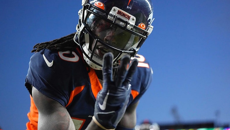 Dec 11, 2022; Denver, Colorado, USA; Denver Broncos wide receiver Jerry Jeudy (10) reacts to his third touchdown reception of the game in the fourth quarter against the Kansas City Chiefs at Empower Field at Mile High. Mandatory Credit: Ron Chenoy-USA TODAY Sports