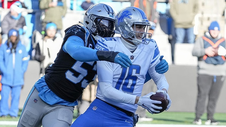 Dec 24, 2022; Charlotte, North Carolina, USA; Carolina Panthers defensive end Brian Burns (53) sacks Detroit Lions quarterback Jared Goff (16) during the second half at Bank of America Stadium. Mandatory Credit: Jim Dedmon-USA TODAY Sports