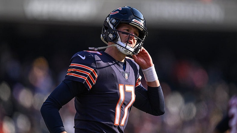 Jan 8, 2023; Chicago, Illinois, USA; Chicago Bears quarterback Tim Boyle (17) runs off the field during the second quarter against the Minnesota Vikings at Soldier Field. Mandatory Credit: Daniel Bartel-USA TODAY Sports