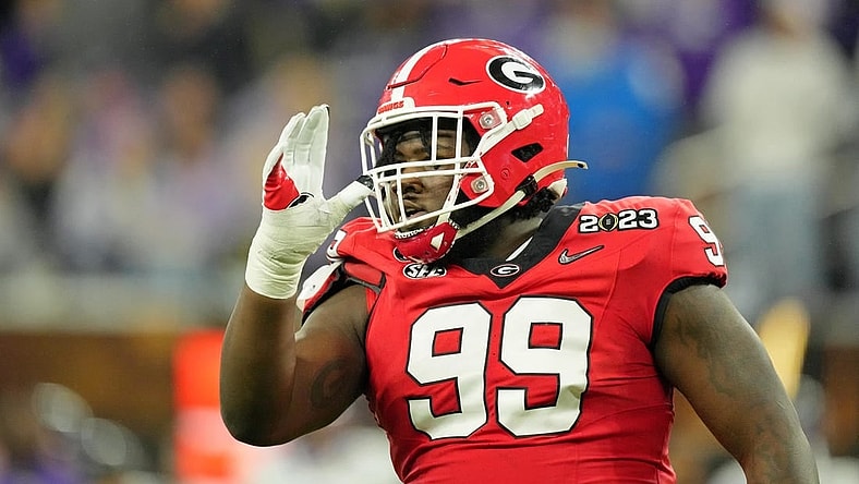 Jan 9, 2023; Inglewood, CA, USA; Georgia Bulldogs defensive lineman Bear Alexander (99) reacts after a play against the TCU Horned Frogs during the second quarter of the CFP national championship game at SoFi Stadium. Mandatory Credit: Kirby Lee-USA TODAY Sports