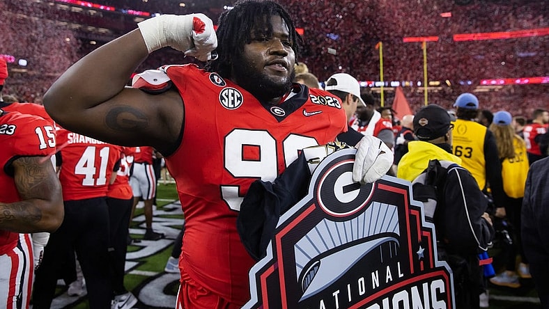 Jan 9, 2023; Inglewood, CA, USA; Georgia Bulldogs defensive lineman Bear Alexander (99) celebrates after defeating the TCU Horned Frogs during the CFP national championship game at SoFi Stadium. Mandatory Credit: Mark J. Rebilas-USA TODAY Sports
