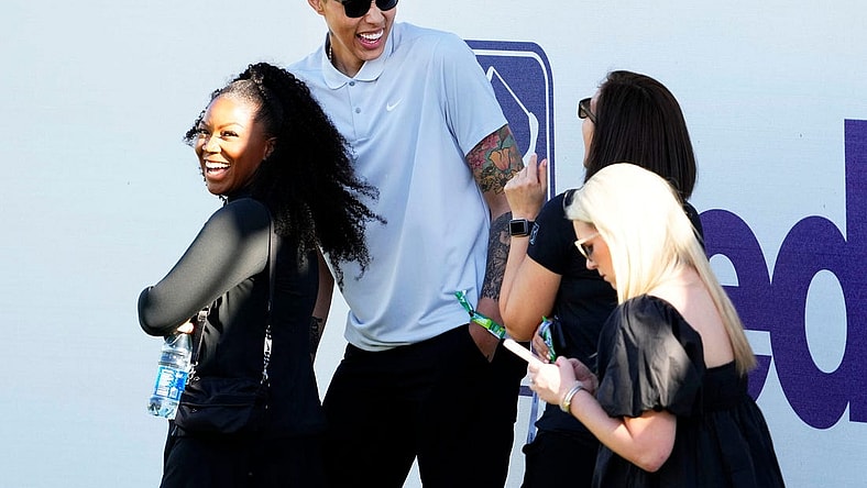 Brittney Griner, center, watches the action on the 16th hole during Round 3 at TPC Scottsdale on Feb. 11, 2023.

Pga Wm Phoenix Open Round 3