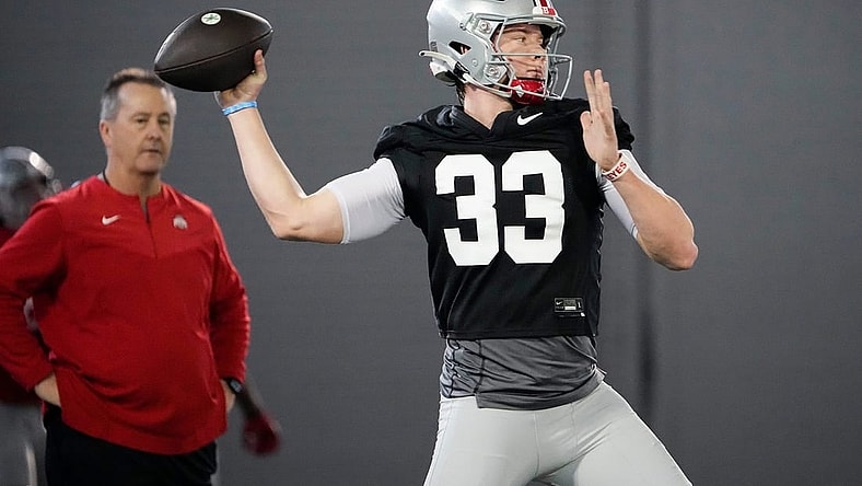 Mar 9, 2023; Columbus, Ohio, USA;  Ohio State Buckeyes quarterback Devin Brown (33) throws during spring football practice at the Woody Hayes Athletic Center. Mandatory Credit: Adam Cairns-The Columbus Dispatch

Football Buckeyes Spring Football