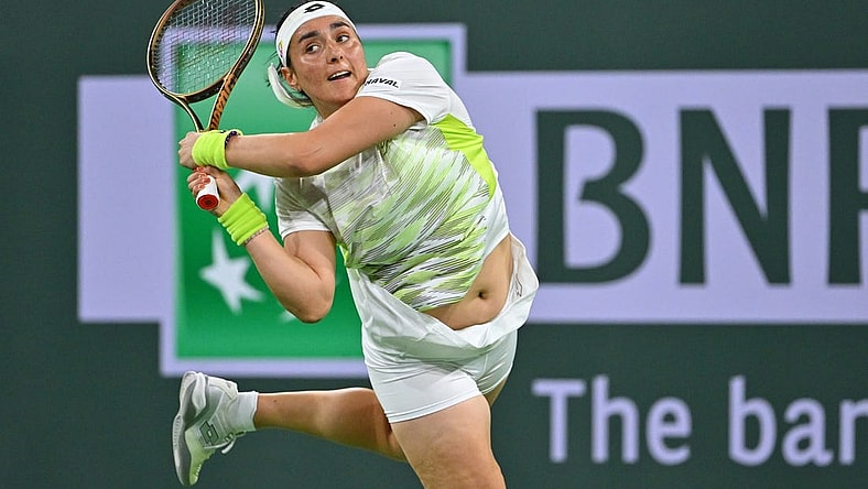 Mar 11, 2023; Indian Wells, CA, USA;  Ons Jabeur (TUN) hits a shot during her second round match against Magdalena Frech (POL) in the BNP Paribas Open at the Indian Wells Tennis Garden. Mandatory Credit: Jayne Kamin-Oncea-USA TODAY Sports