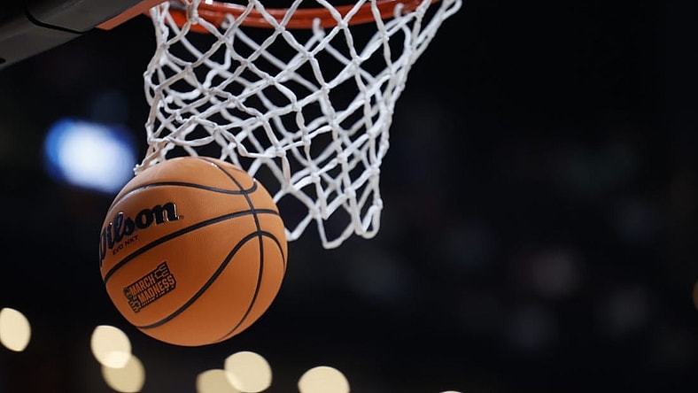 Mar 17, 2023; Columbus, OH, USA;  A basketball displaying the March Madness logo enter the basket before the game between the USC Trojans and the Michigan State Spartans at Nationwide Arena. Mandatory Credit: Rick Osentoski-USA TODAY Sports