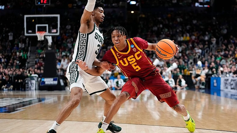 Mar 17, 2023; Columbus, Ohio, USA;  USC Trojans guard Boogie Ellis (5) dribbles aroun dMichigan State Spartans guard Jaden Akins (3) during the first round of the NCAA men   s basketball tournament at Nationwide Arena. Mandatory Credit: Adam Cairns-The Columbus Dispatch

Basketball Ncaa Men S Basketball Tournament