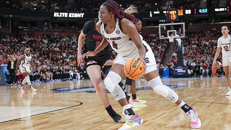 Mar 27, 2023; Greenville, SC, USA; South Carolina Gamecocks forward Aliyah Boston (4) drives to the basket against the Maryland Terrapins during the second half at the NCAA Women s Tournament at Bon Secours Wellness Arena. Mandatory Credit: Jim Dedmon-USA TODAY Sports