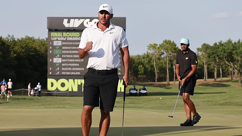 Apr 2, 2023; Orlando, Florida, USA; Brooks Koepka of the Smash golf club gives a fist pump after making the winning putt on the 18th green during the final round of a LIV Golf event at Orange County National. Mandatory Credit: Reinhold Matay-USA TODAY Sports