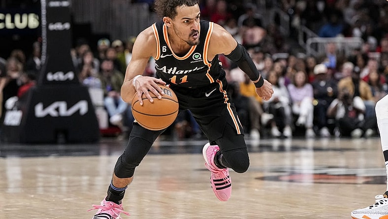 Apr 2, 2023; Atlanta, Georgia, USA; Atlanta Hawks guard Trae Young (11) dribbles against the Dallas Mavericks during the second half at State Farm Arena. Mandatory Credit: Dale Zanine-USA TODAY Sports