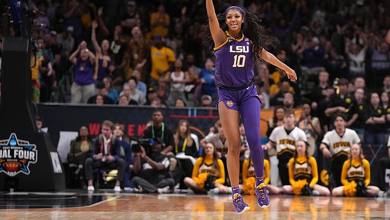 Apr 2, 2023; Dallas, TX, USA; LSU Lady Tigers forward Angel Reese (10) celebrates during the NCAA Womens Basketball Final Four National Championship against the Iowa Hawkeyes at American Airlines Center. Mandatory Credit: Kirby Lee-USA TODAY Sports