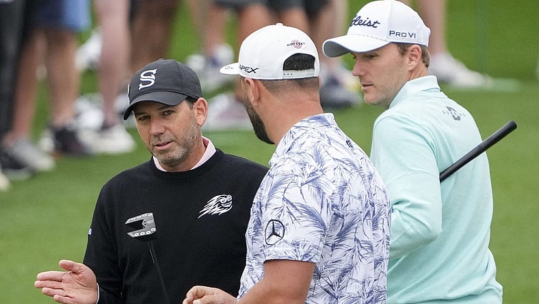 Apr 3, 2023; Augusta, Georgia, USA; Sergio Garcia (from left), Jon Rahm and Russell Henley talk at the practice facility during a practice round for The Masters golf tournament at Augusta National Golf Club. Mandatory Credit: Danielle Parhizkaran-USA TODAY Network

Pga The Masters Practice Round