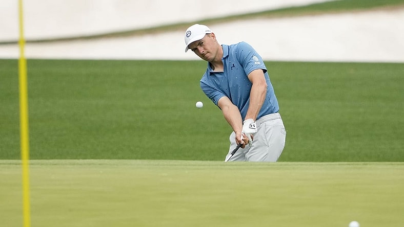 Apr 3, 2023; Augusta, Georgia, USA; Jordan Spieth chips balls at the practice facility during a practice round for The Masters golf tournament at Augusta National Golf Club. Mandatory Credit: Michael Madrid-USA TODAY Network