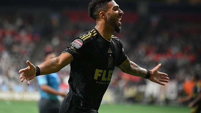Apr 5, 2023; Vancouver, British Columbia, CAN;  Los Angeles FC forward Denis Bouanga (99) celebrates his goal against Vancouver Whitecaps FC goalkeeper Yohei Takaoka (18) (not pictured) during the second half at BC Place. Mandatory Credit: Anne-Marie Sorvin-USA TODAY Sports