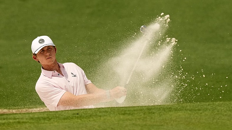 Apr 6, 2023; Augusta, Georgia, USA; Gordon Sargent plays a shot from a bunker on the second hole during the first round of The Masters golf tournament. Mandatory Credit: Michael Madrid-USA TODAY Network