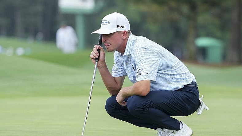 Apr 6, 2023; Augusta, Georgia, USA; Sam Bennett lines up his putt on the eighth green during the first round of The Masters golf tournament. Mandatory Credit: Danielle Parhizkaran-USA TODAY Network