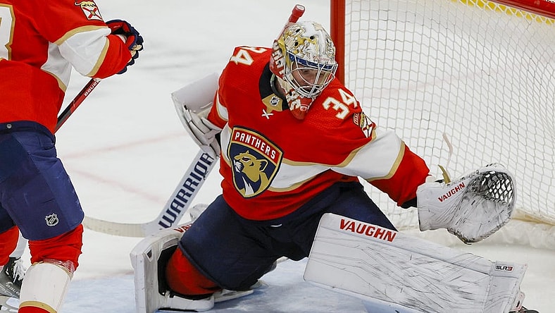 Apr 6, 2023; Sunrise, Florida, USA;Florida Panthers goaltender Alex Lyon (34) makes a save during the third period against the Ottawa Senators at FLA Live Arena. Mandatory Credit: Sam Navarro-USA TODAY Sports