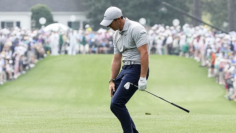 Apr 7, 2023; Augusta, Georgia, USA; Rory McIlroy reacts to his shot after hitting from the first fairway during the second round of The Masters golf tournament. Mandatory Credit: Rob Schumacher-USA TODAY Network