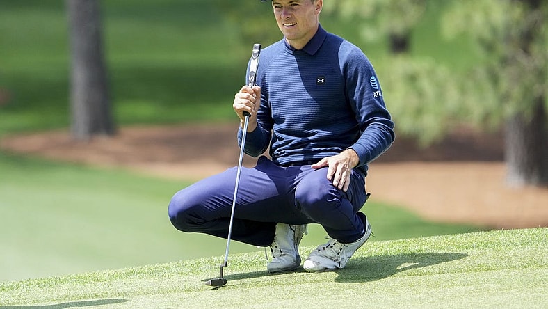 Apr 9, 2023; Augusta, Georgia, USA; Jordan Spieth lines up his putt on the seventh green during the final round of The Masters golf tournament. Mandatory Credit: Danielle Parhizkaran-USA TODAY Network