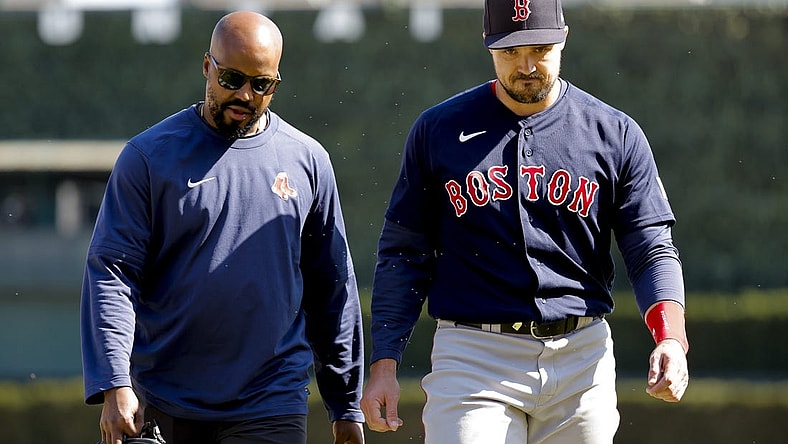Apr 9, 2023; Detroit, Michigan, USA;  Boston Red Sox center fielder Adam Duvall (18) walks off the field with the trainer during the ninth inning against the Detroit Tigers at Comerica Park. Mandatory Credit: Rick Osentoski-USA TODAY Sports