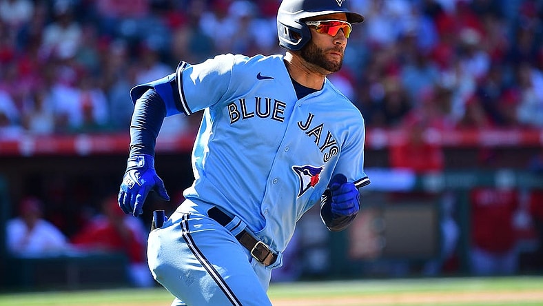 Apr 9, 2023; Anaheim, California, USA; Toronto Blue Jays center fielder Kevin Kiermaier (39) runs after hitting a ground rule RBI double against the Los Angeles Angels during the tenth inning at Angel Stadium. Mandatory Credit: Gary A. Vasquez-USA TODAY Sports