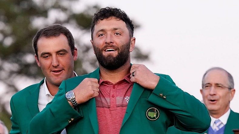 Scottie Scheffler (left) helps Jon Rahm into his green jacket after Rahm's Masters win.

Pga Masters Tournament Final Round