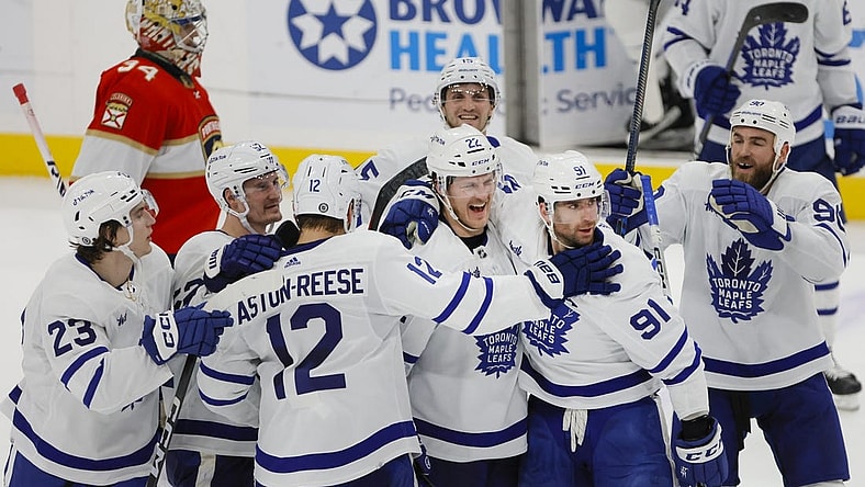 Apr 10, 2023; Sunrise, Florida, USA; Toronto Maple Leafs center John Tavares (91) celebrates with defenseman Jake McCabe (22), center Zach Aston-Reese (12), left wing Matthew Knies (23), center Noel Acciari (52), and center Ryan O'Reilly (90) after scoring the game-winning goal during overtime against the Florida Panthers at FLA Live Arena. Mandatory Credit: Sam Navarro-USA TODAY Sports