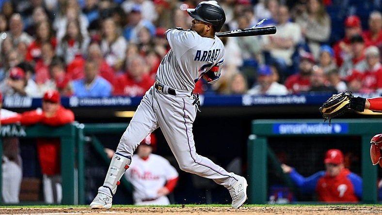 Apr 11, 2023; Philadelphia, Pennsylvania, USA; Miami Marlins second baseman Luis Arraez (3) hits a triple against the Philadelphia Phillies in the sixth inning at Citizens Bank Park. Mandatory Credit: Kyle Ross-USA TODAY Sports